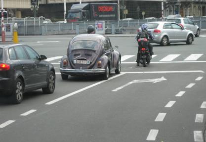 Figure 9. Photo of motorcyclist at advanced stop line with queue-jumping designated lane.