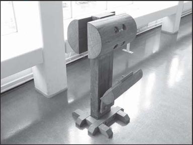 Photo of a section of wooden guardrail.